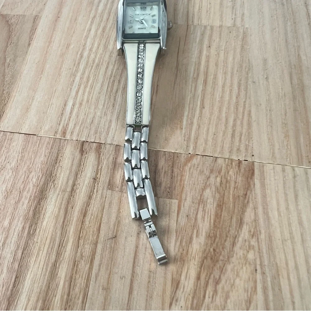 The limited ladies rectangular silver tone bracelet watch NEW BATTERY
